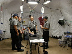 Members of the Homeland Security Mobile Trauma Unit inside the operating room.