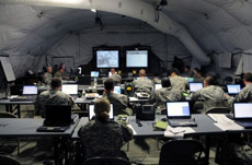 Members of the 2nd BCT, 82nd Airborne Division working in their command post just two days after arriving in Port Au Prince, Haiti on January 26th, 2010 (U.S. Army photo by Combat Photographer Master Sergeant Martin Cervantez/Released). 