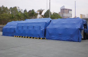 A single 250 patient Reeves Decon System (center) with undress and redress sections (end shelters) purchased by the Hong Kong Fire Department for the 2008 Summer Olympic Games in Beijing.