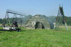 A DRASH J Shelter undergoes wind and rain testing at the Military's Aberdeen Test Center.